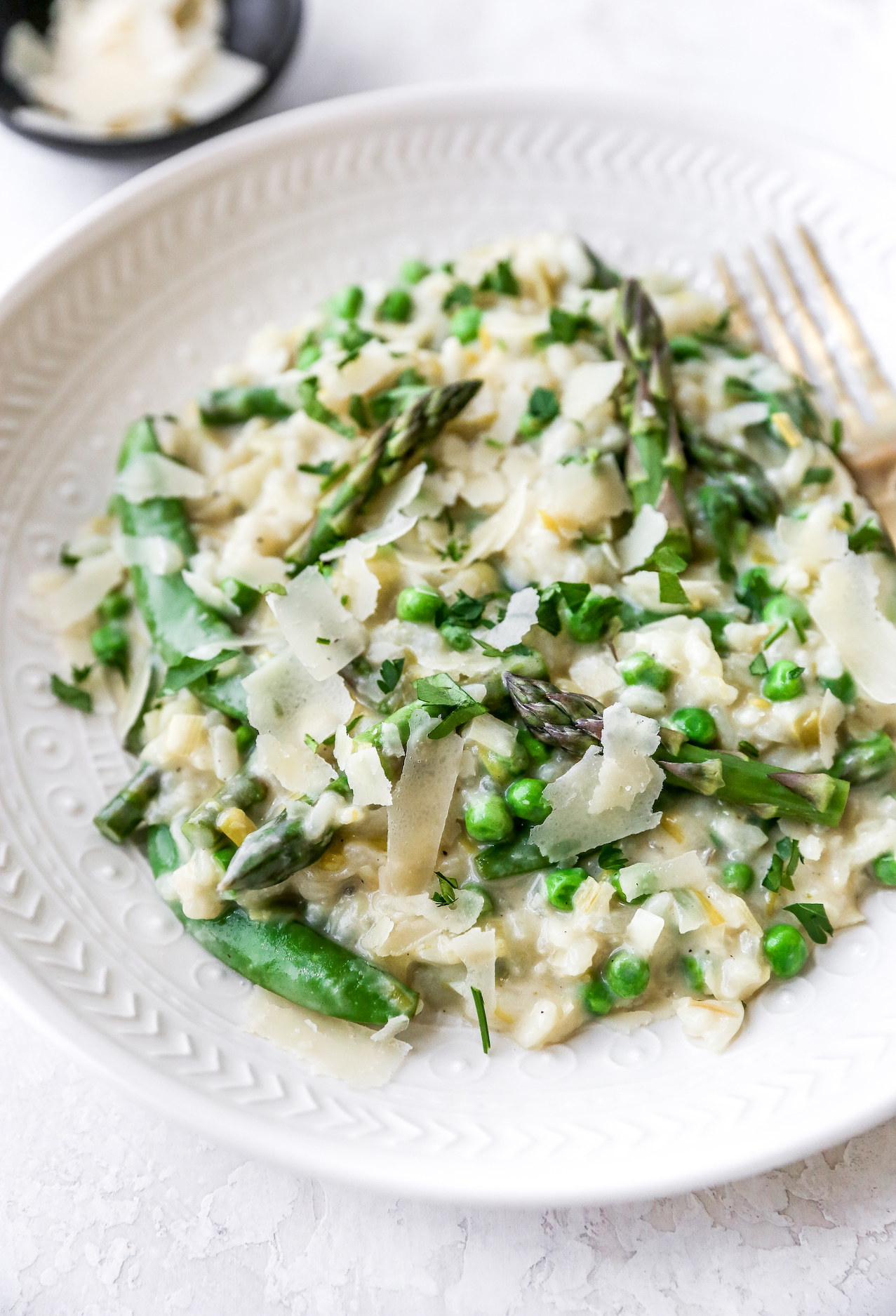 Spring risotto with peas, asparagus, leeks, and Parmesan.