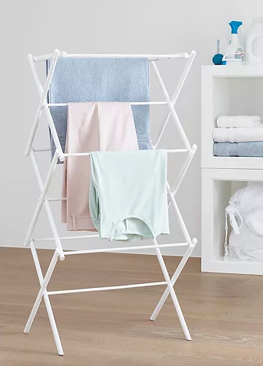 Clothes hanging on dryer rack