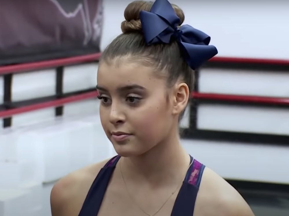 A young Kalani in dance attire