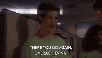 A gif of a person saying &quot;there you go again, overachieving&quot;