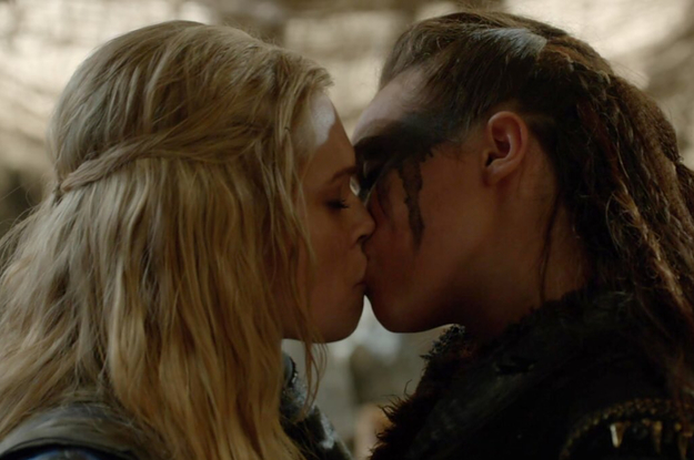 A close up of Clarke and Lexa from "The 100" as they kiss