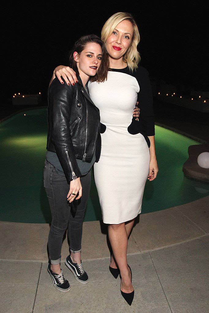 Kristen and Tara pose for a picture with their arms around each other