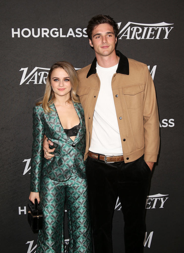 Joey and Jacob posing arm-in-arm on the red carpet