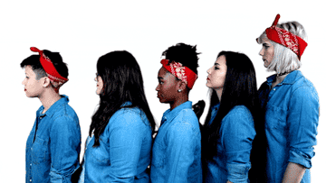 Women from BuzzFeed LadyLike flex in the style of Rosie the Riveter