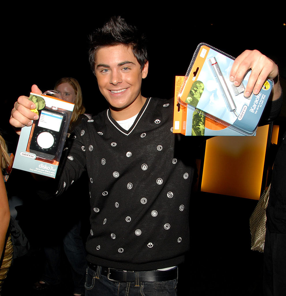 zac holding an ipod case