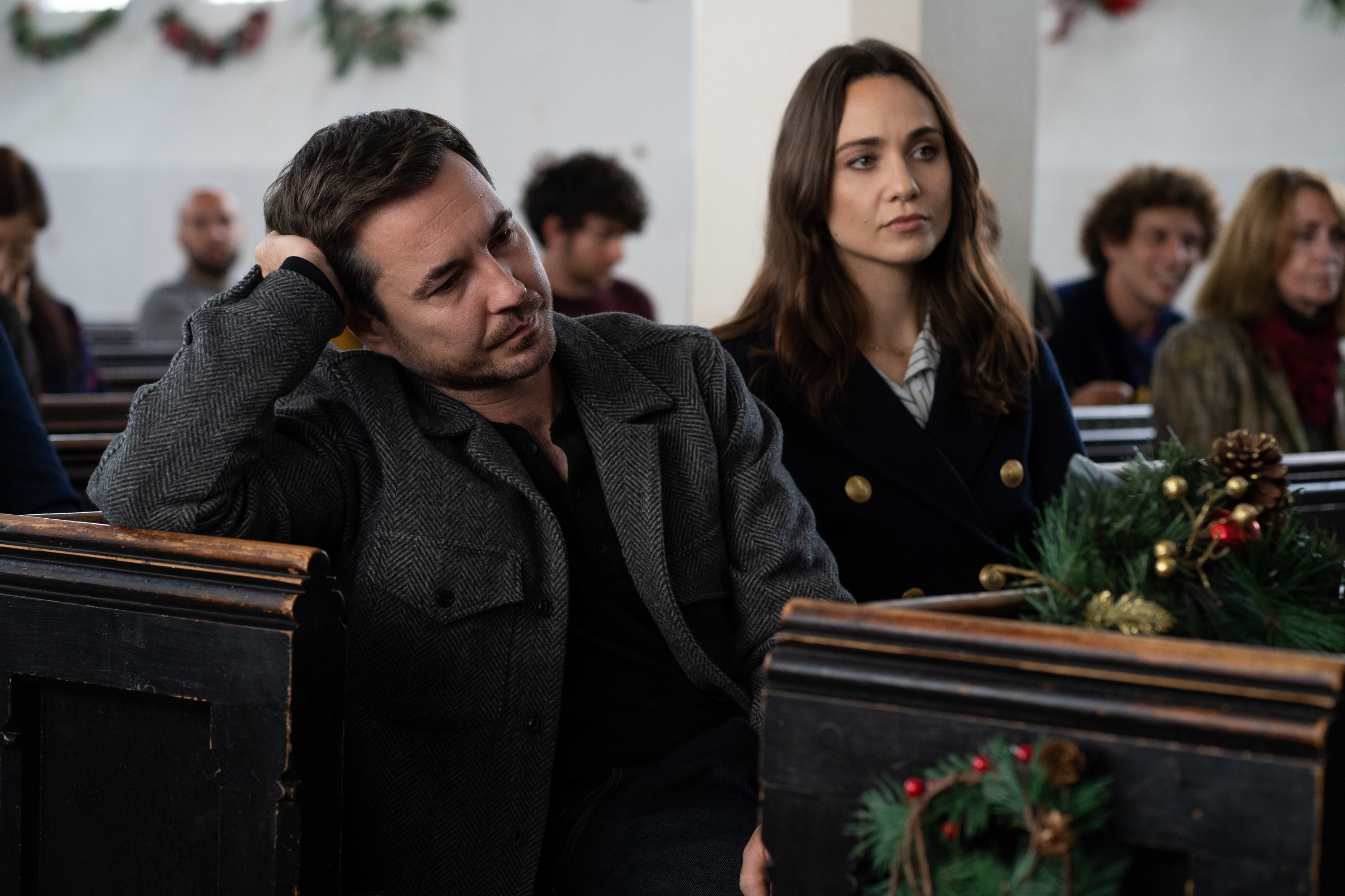 Tuppence Middleton as Fi Lawson sitting next to a tired looking Martin Compston as Bram Lawson in a church
