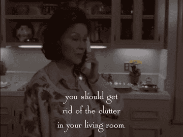 a gif of Emily Gilmore in &quot;Gilmore Girls&quot; talking on the phone saying &quot;you should get rif of the clutter in your living room mayybe. That room is a hazard&quot;