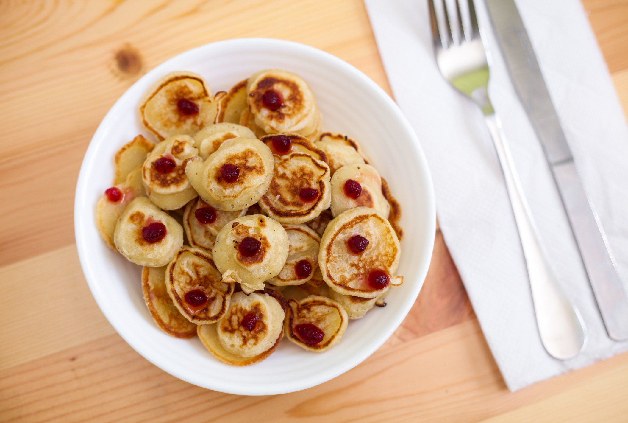 Small medallions of pancakes in a bowl