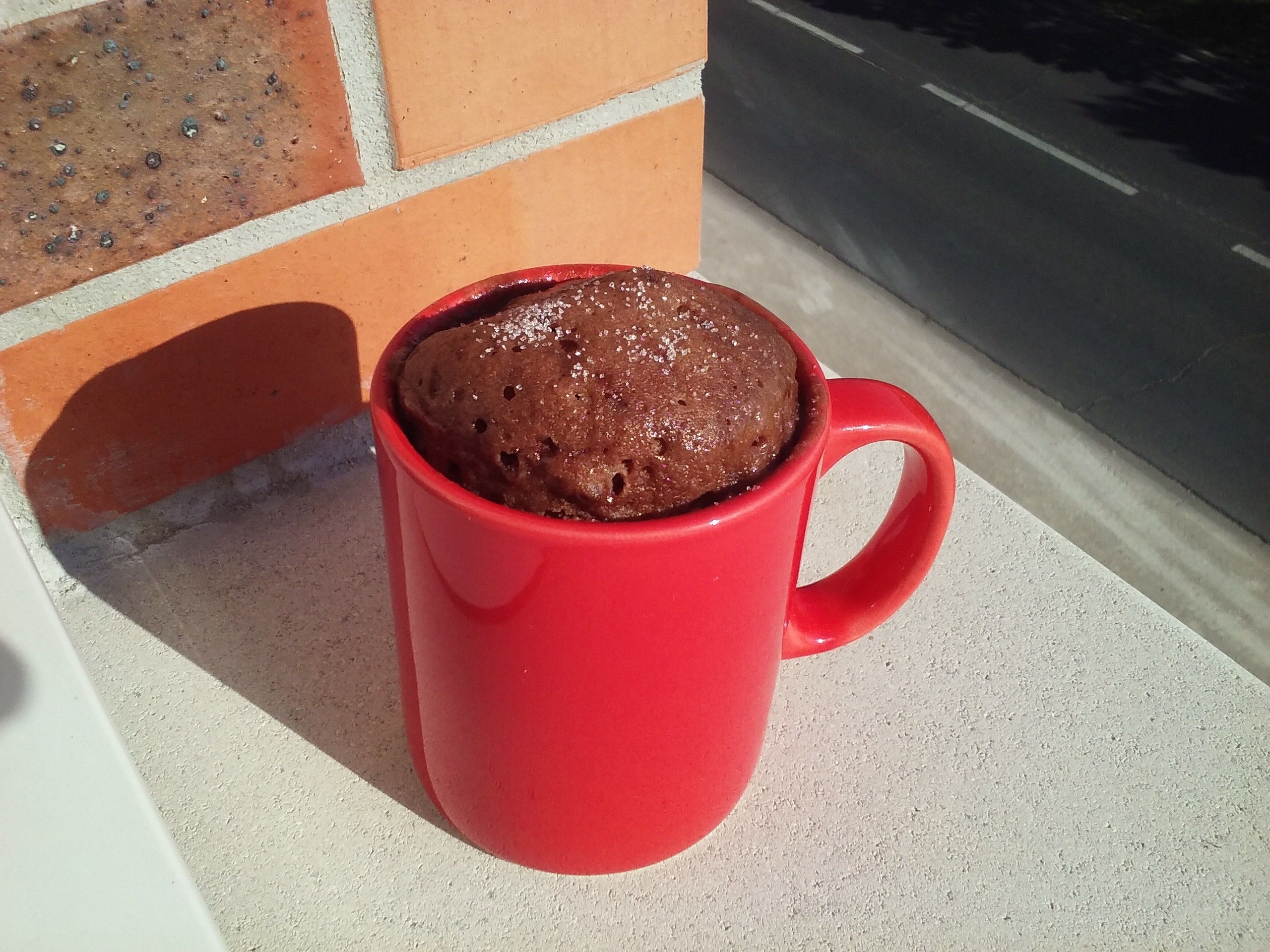 A chocolate cake baked in a mug