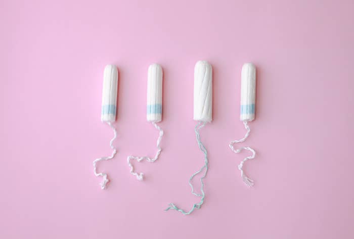 Sanitary tampons over pink background