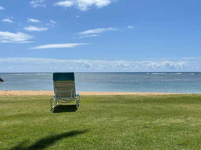 A lounge chair on a sunny beach on Oahu