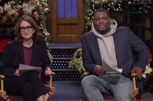 tina fey and michael che doing weekend update on snl