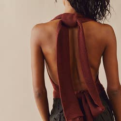 the same model shows the back view tied in a halter design