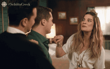 Alexis Rose booping Patrick on the nose in &quot;Schitt&#x27;s Creek&quot;