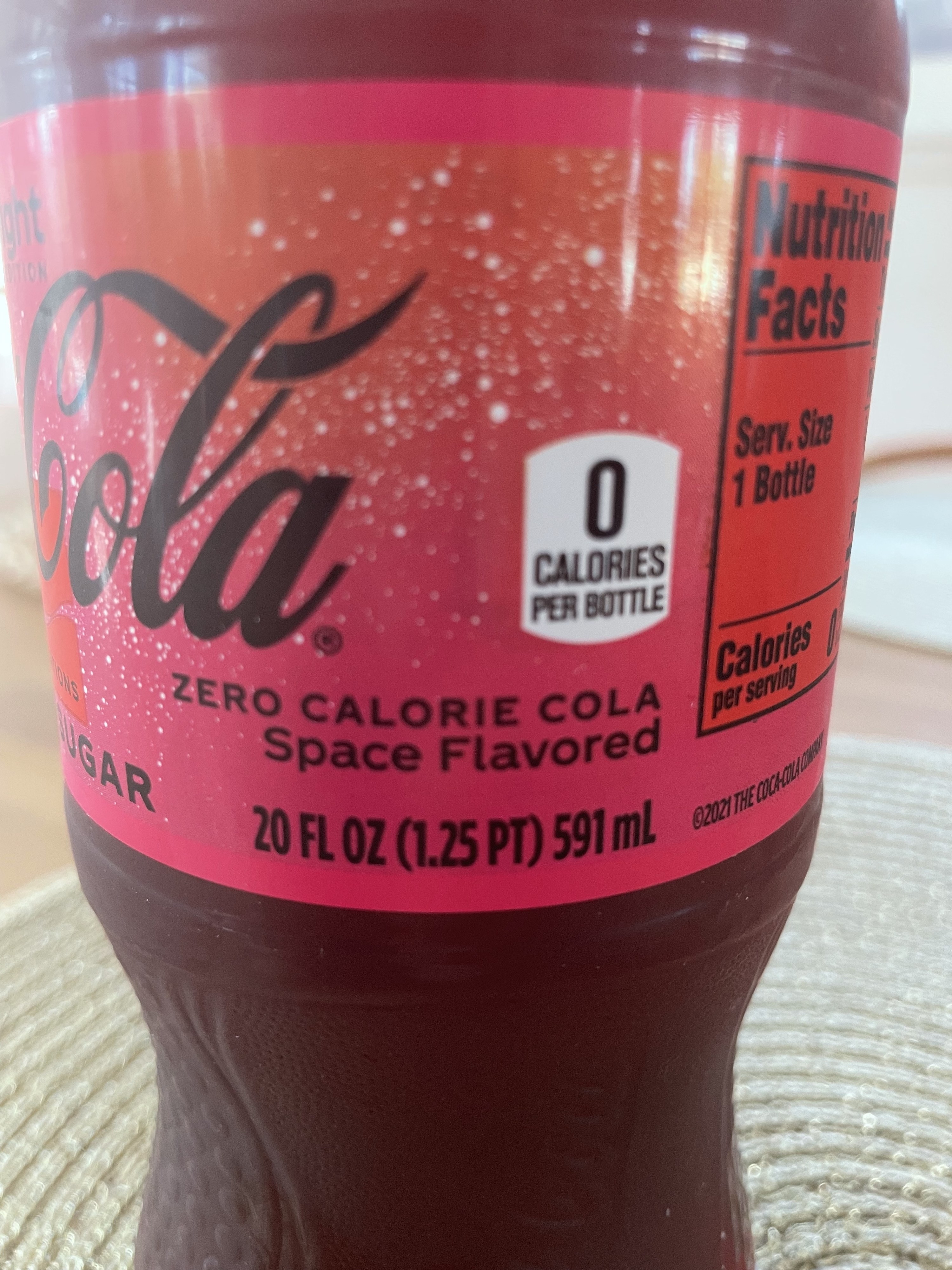 A close-up of the label, which says, &quot;Zero calorie cola, space flavored&quot;