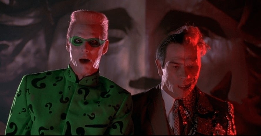Jim Carrey and Tommy Lee Jones as the Riddler and Two-Face looking shocked