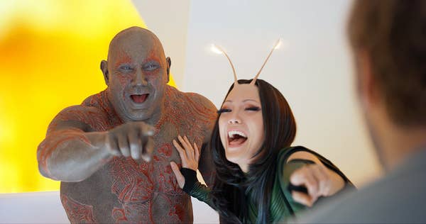 Drax and Mantis laugh and point at Star Lord