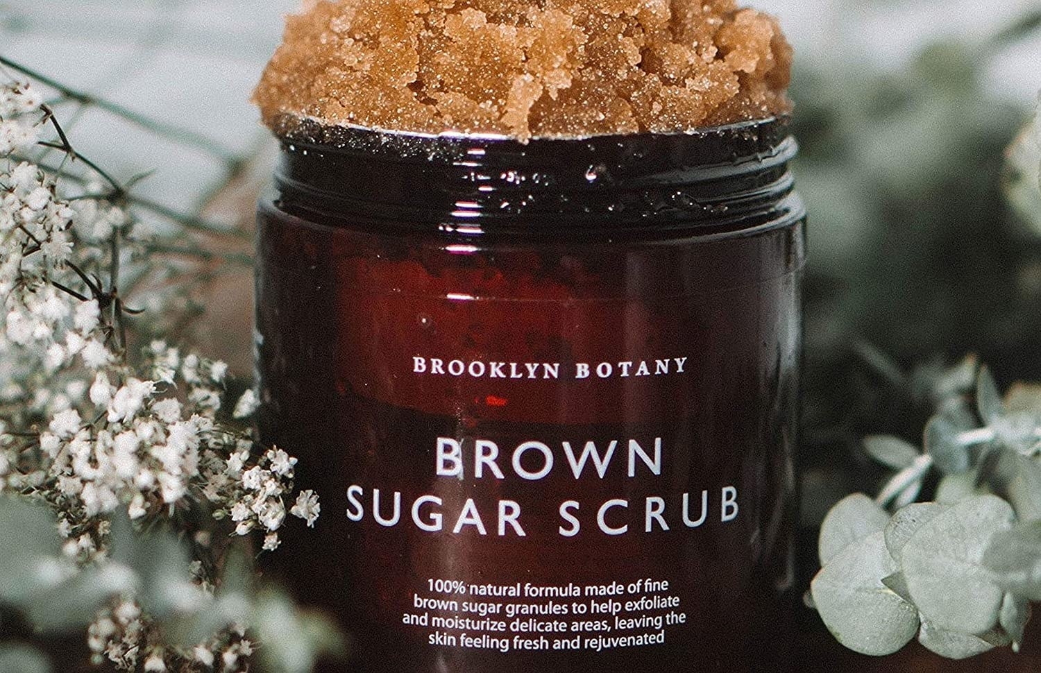 the brown sugar body scrub in its jar