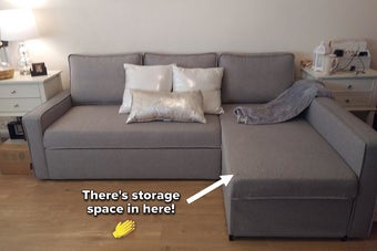 reviewer photo of gray sectional sofa in a living room