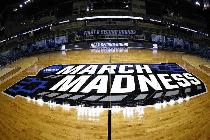 March Madness graphic on a basketball court