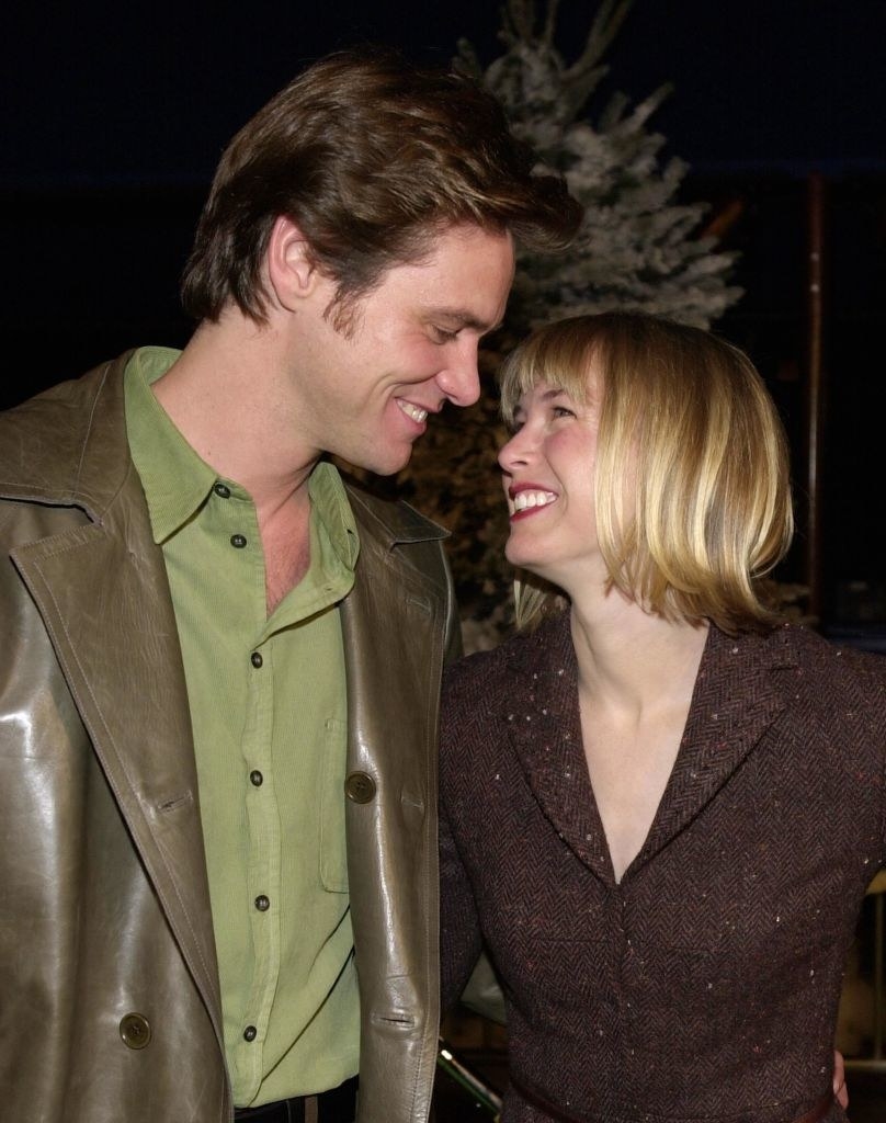 Carrey and his ex Renée Zellweger smiling at each other