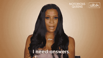 Woman shaking her head and saying &quot;I need answers&quot;