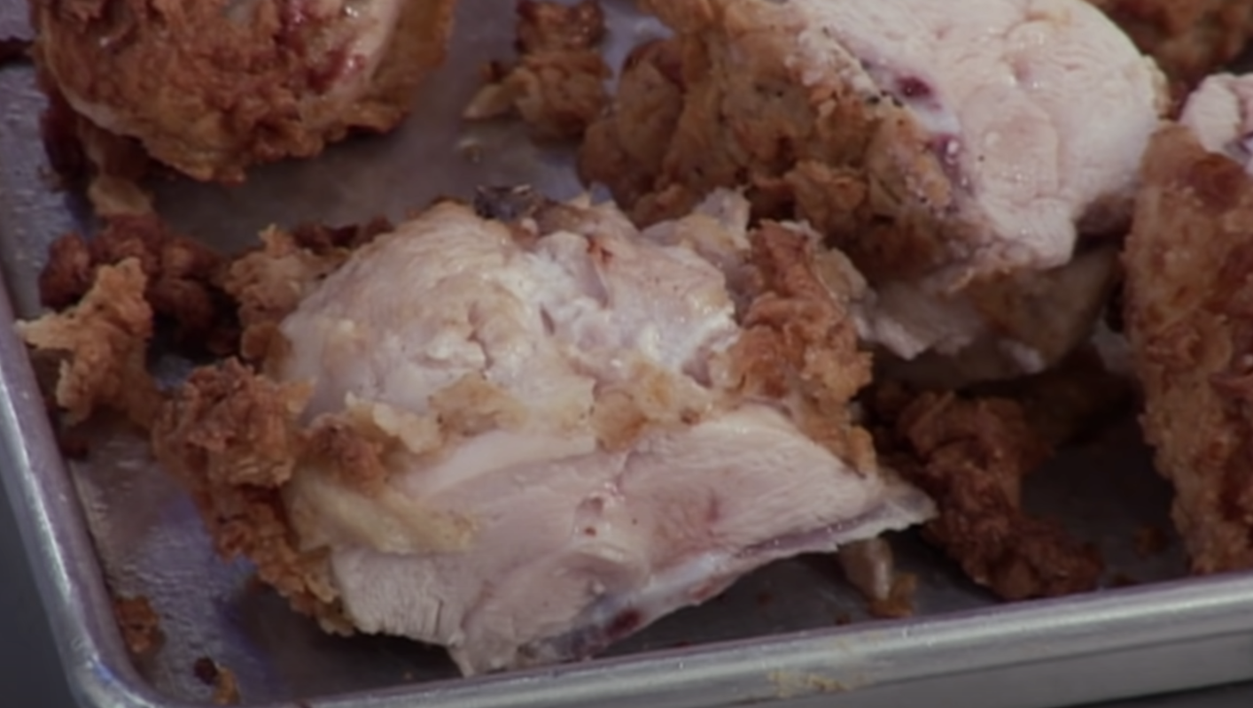 Fried chicken raw on the inside