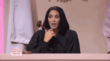 Kim Kardashian as a judge holding a gavel from an SNL skit