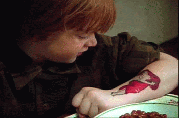 Little Pete flexing his forearm tattoo, Petunia