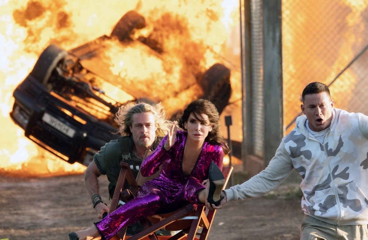 Tatum and Sandra Bullock running away from a fire