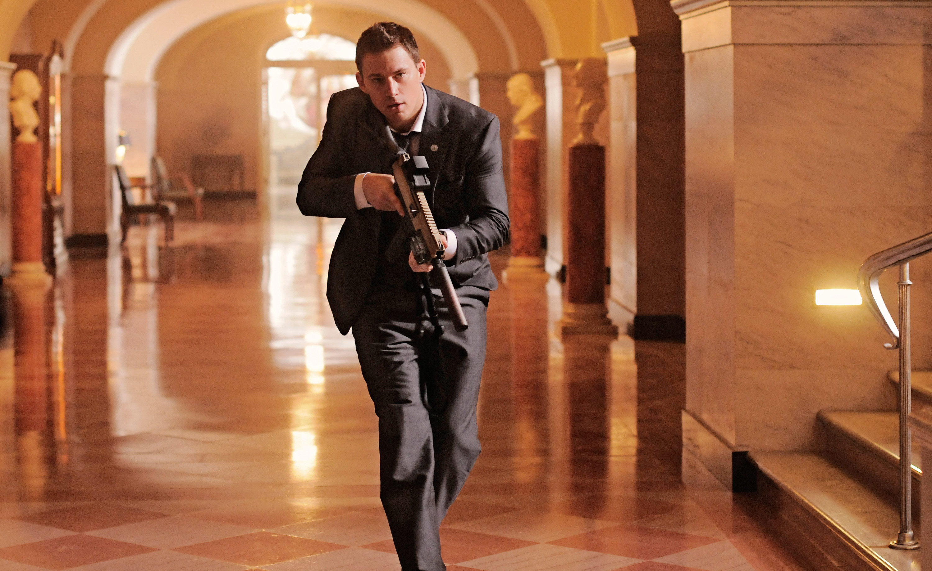 Tatum running through the White House with a gun