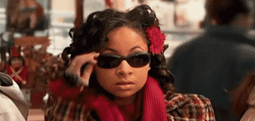 Raven Baxter from &quot;That&#x27;s So Raven&quot; fiercely taking off her sunglasses
