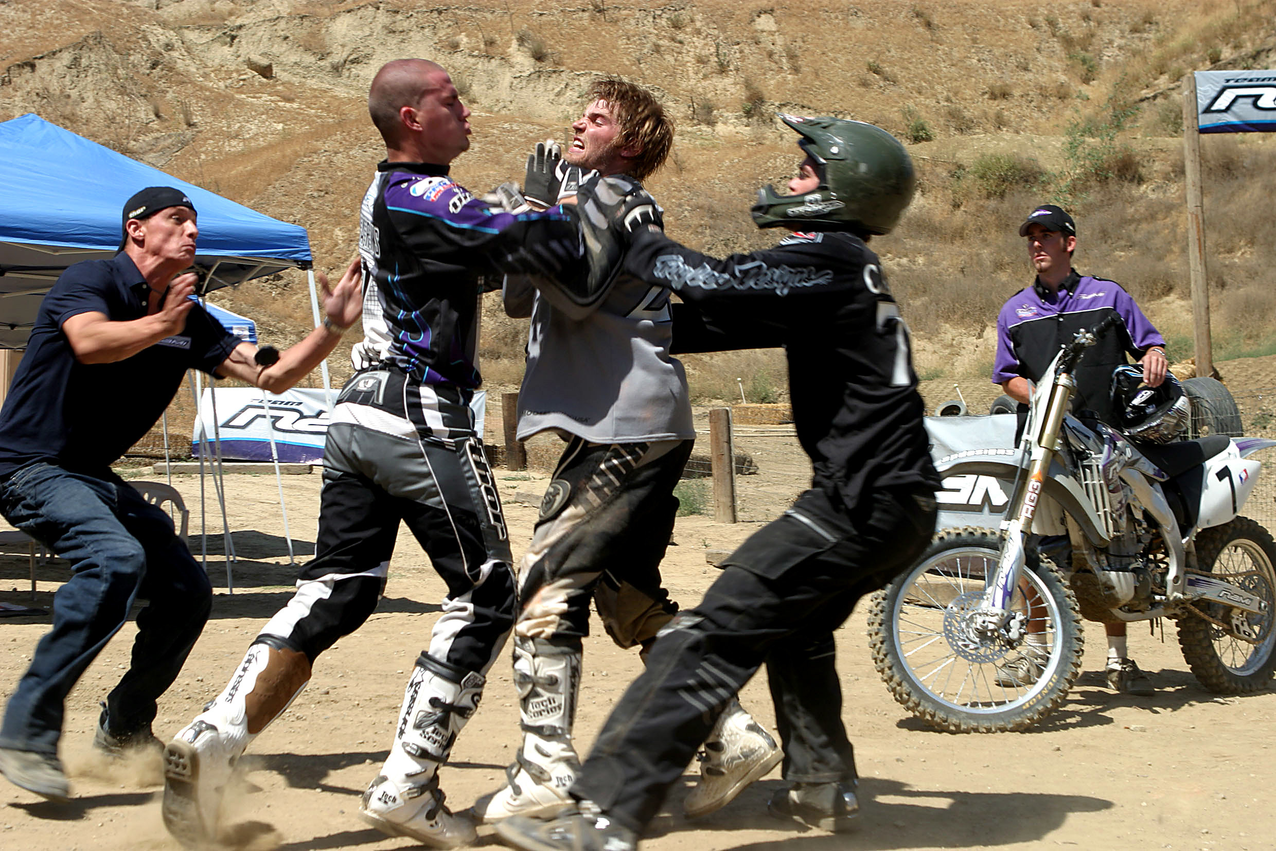 Tatum trying to stop a fight among cyclists