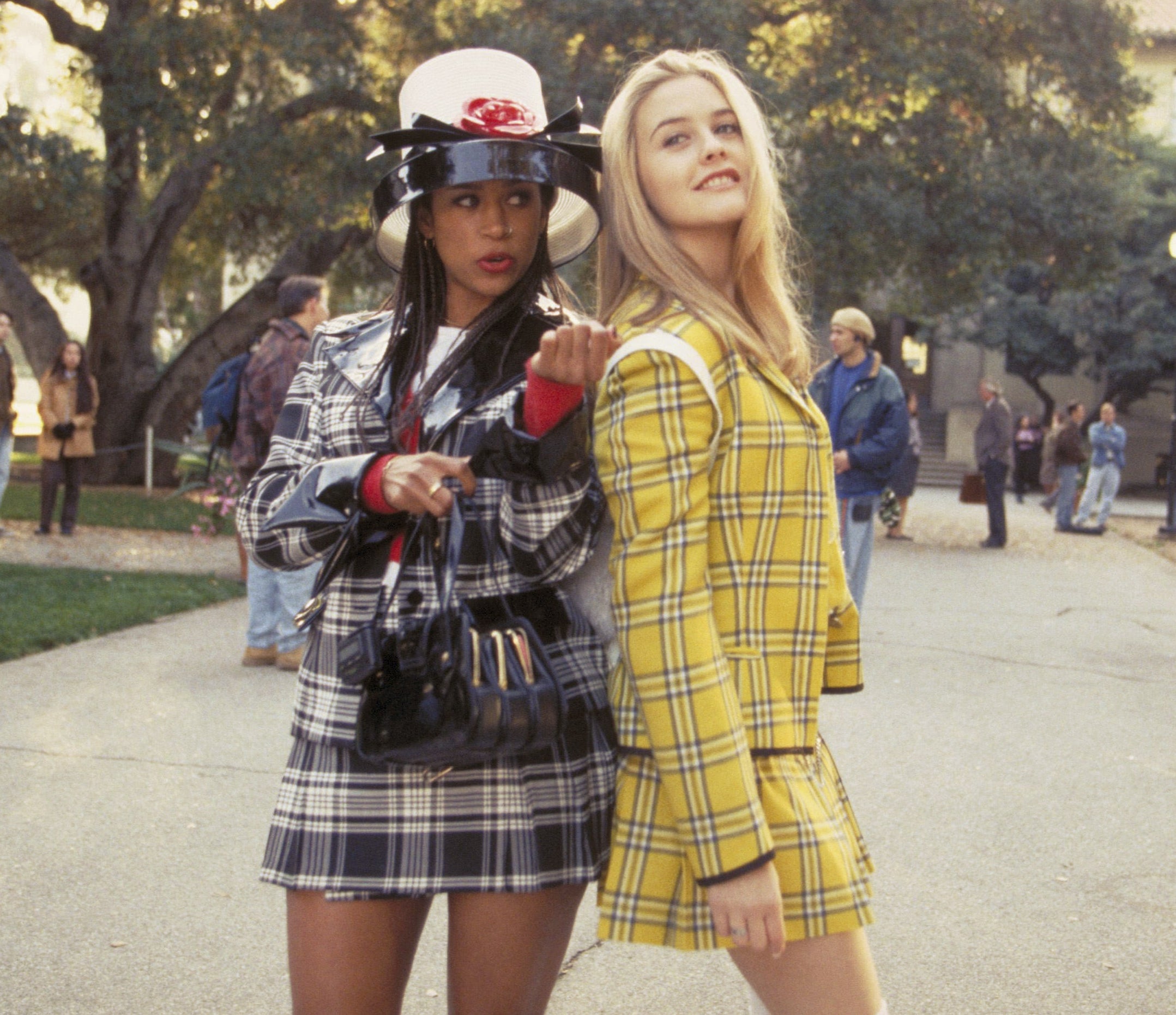 Stacey Dash and Alicia Silverstone wearing plaid skirt suits