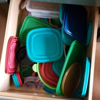 Reviewer photo showing lids before using organizer
