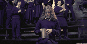 Hermione Granger reading a book