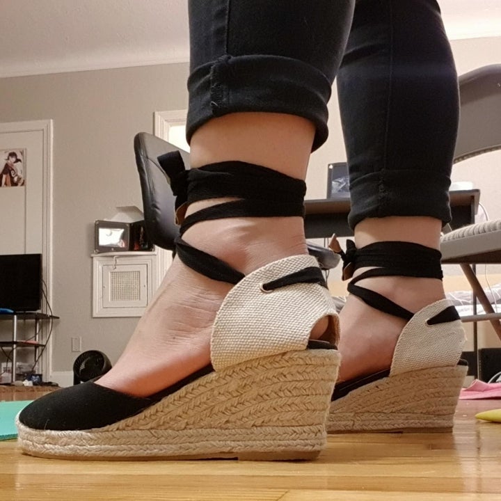 reviewer photo of side of black closed_toe espadrilles with wedge heel