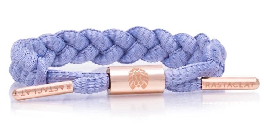 a lavender braided bracelet with rose gold accents