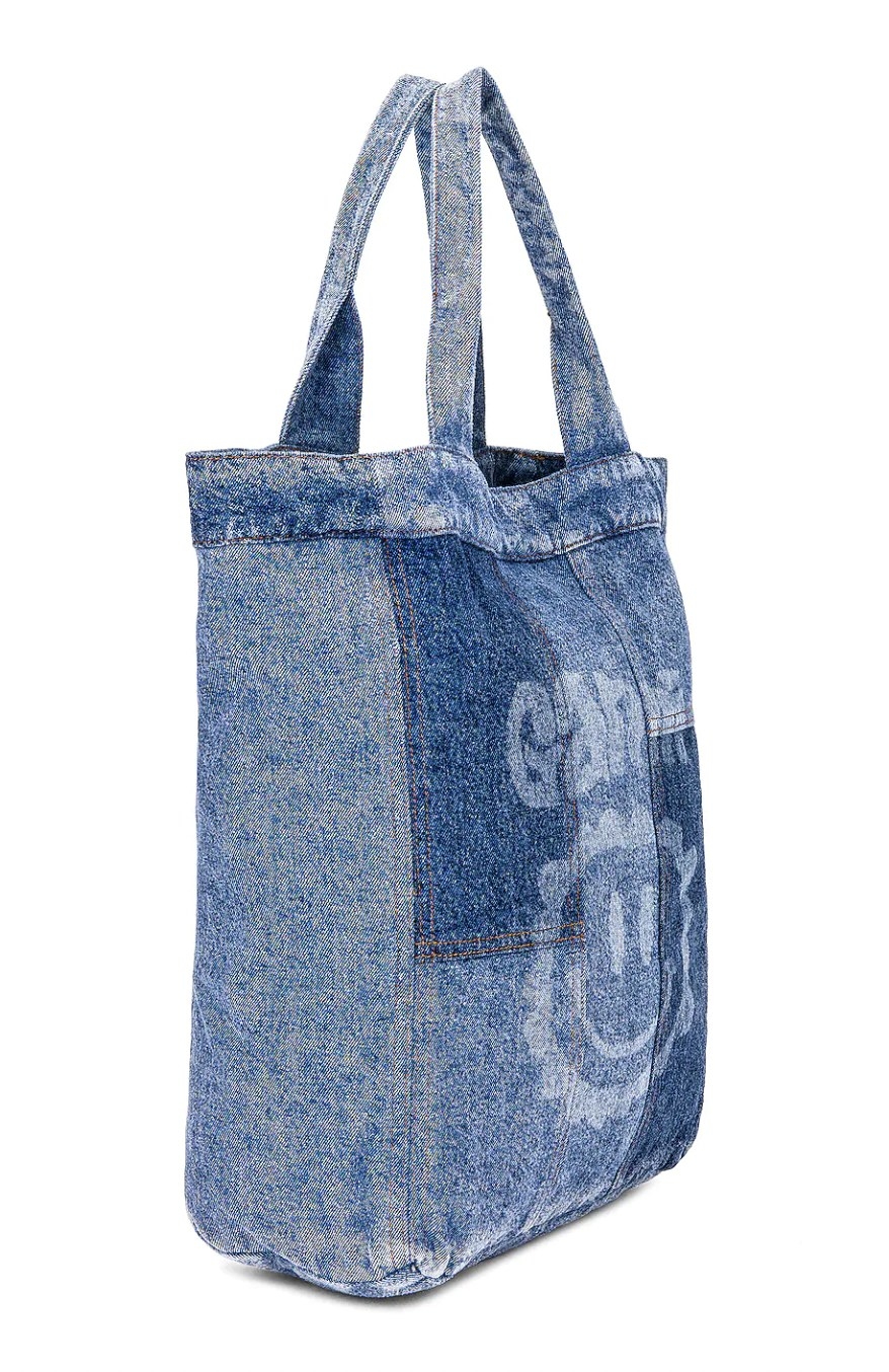 The denim bag with Ganni logo and smiley face print on front