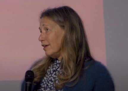 Susan Kare speaking at a conference