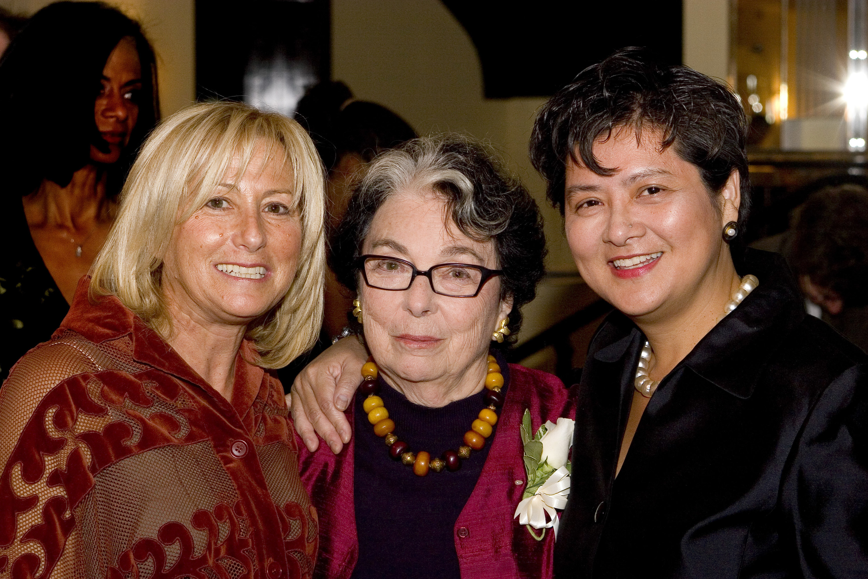 Joanie Horton, Feminist Press founder Florence Howe, and Chair, Board of Directors Linda Y. Peng smiling