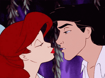 Ariel and Eric about to kiss on the rowboat