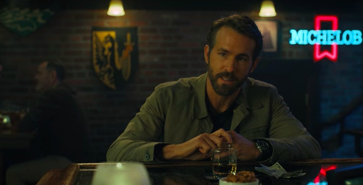 Adult Adam sitting at a bar in &quot;The Adam Project&quot;