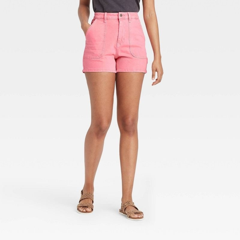 model wearing the shorts in pink