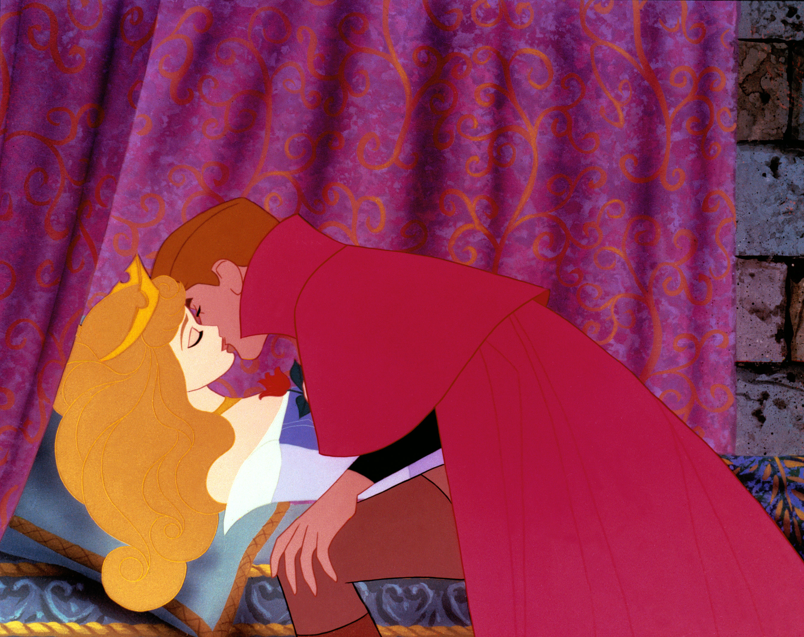 Prince Phillip kissing a sleeping Aurora