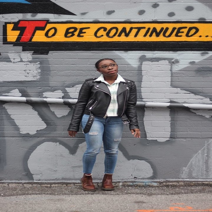 Reviewer wearing the black Levi's faux leather motorcycle jacket