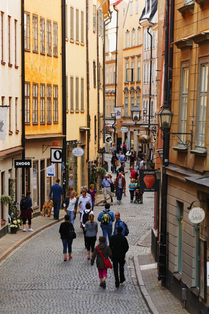 Pedestrians walking on a quaint street