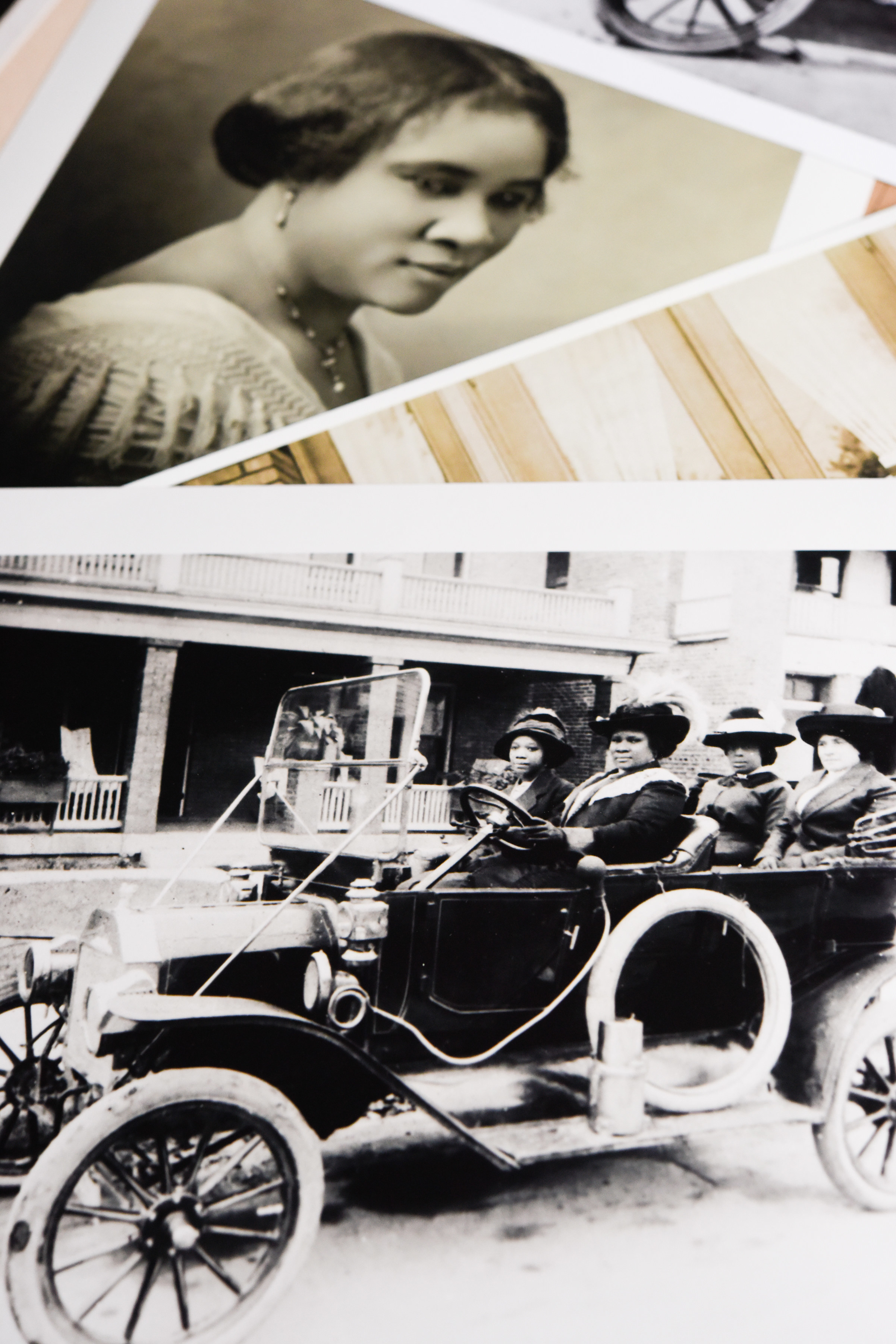 On the bottom is a picture of Madam C.J. Walker driving a car outside of her Indianapolis home in 1912. On the top is the Iconic photo of her taken in 1913 by Addison Scurlock.