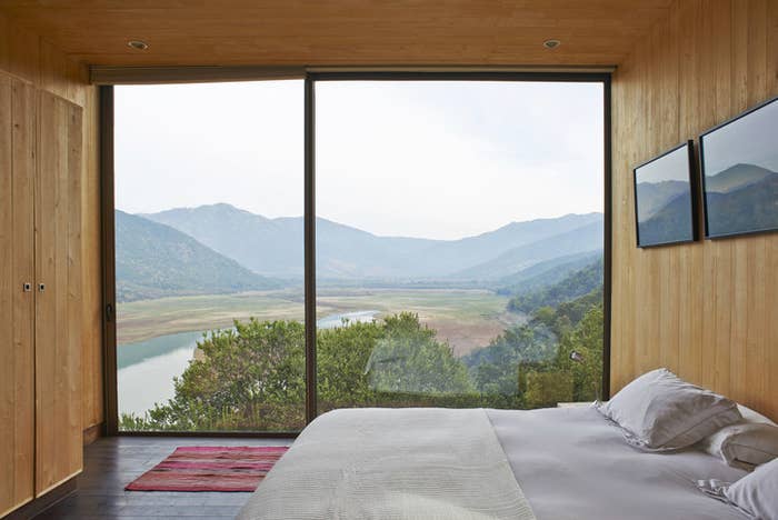 A hotel room at the Vina Vik Retreat in San Vicente Chile overlooking wine vineyards