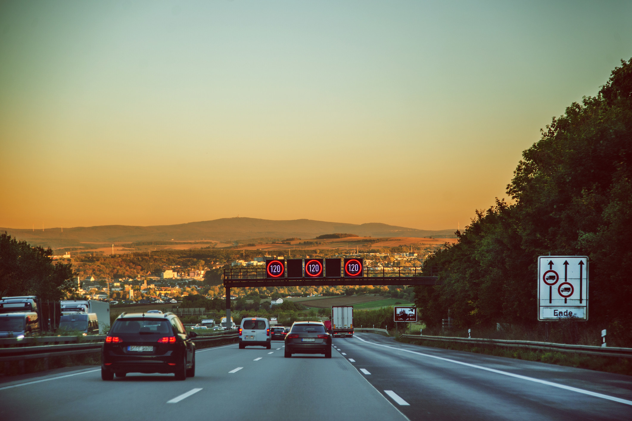 Driver&#x27;s view on busy highway with cars and trucks